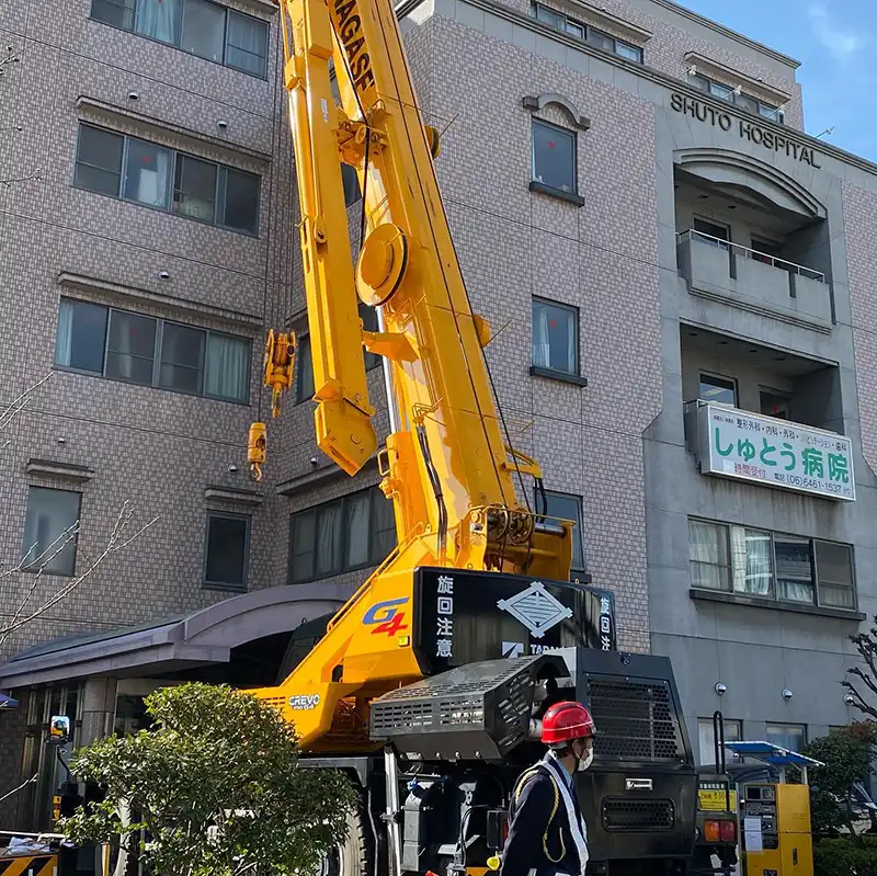 大阪府大阪市福島区　レッカー工事の現場　歩行者および車両の誘導等